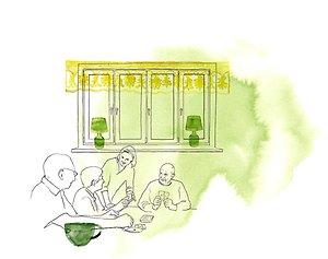 En äldre dams hand stödjer sig på en rullator.